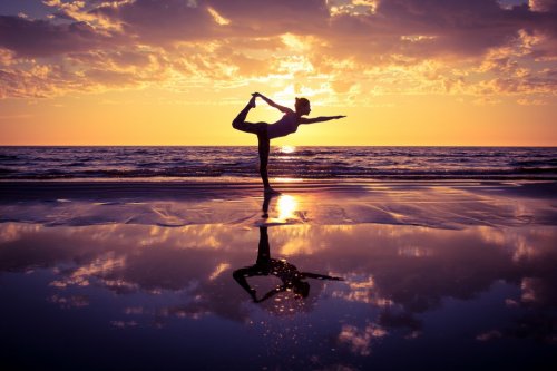 woman practicing yoga - 901147941