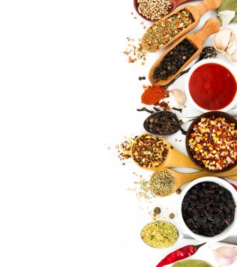 Fragrant seasonings and spices on white background