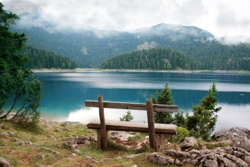 Relax. Rest near lake. Bench near lake. Beautiful mystical lake. Black Lake, Durmitor National Park. Montenegro