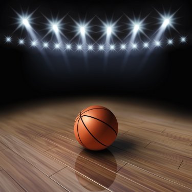 Ball on basketball court with spotlights , Arena