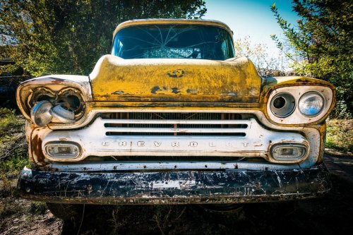 Yellow Chevy Pickup Truck in Low Photography