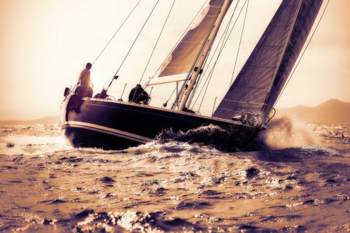 sail boat sailing on sunset - 901149487