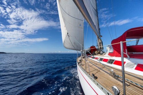 Sailing yacht in blue sea - 901149488