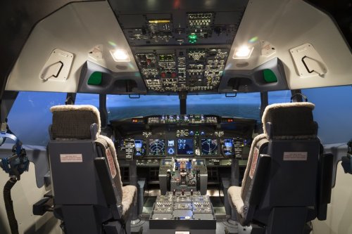Cockpit of plane in flight simulator - 901150361