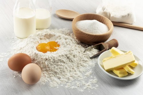 Ingredients for dough and pastry on wooden table - 901152499