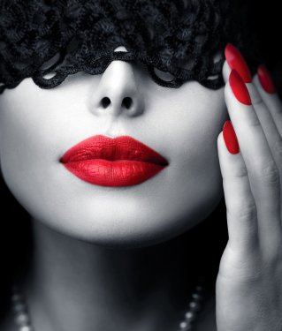 Beautiful Woman with Black Lace Mask over her Eyes