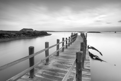 Ancient pier and abandoned boat at black and white fine art photography  - 901152870