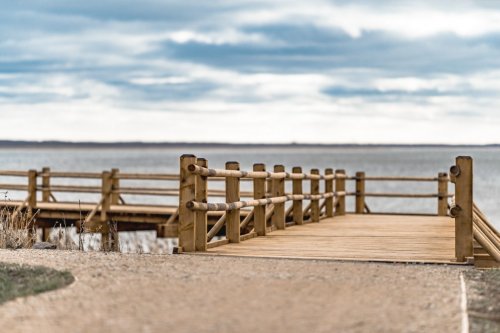 Wooden platform by the lake - 901155160