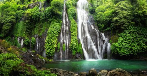 Jungle waterfall cascade in tropical rainforest with rock and turquoise blue ... - 901156036