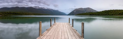 Landscape photo of a jetty on Lake Rotoiti, New Zealand. This jetty is within the Nelson Lakes National Park and is one of the most Instagrammed locations in New Zealand