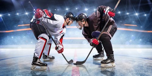 Hockey players starts game around ice arena - 901156198