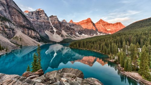 Moraine Lake in Banff National Park in Canada taken at the peak color of sunrise - 901156844