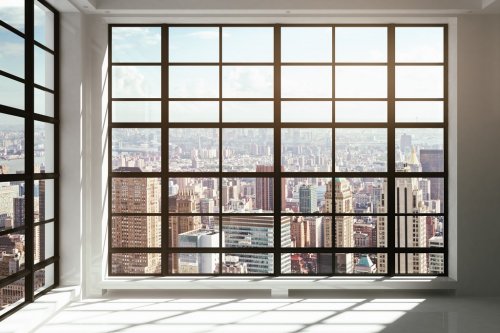 Floor-to-ceiling windows with city view - 901157456