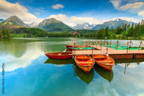 Wooden boats on the mountain lake Strbske Pleso, Slovakia, Europe