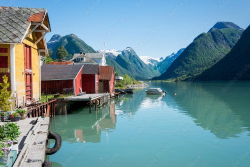 Fjord, mountains, boathouse and reflection in Norway - 901157850