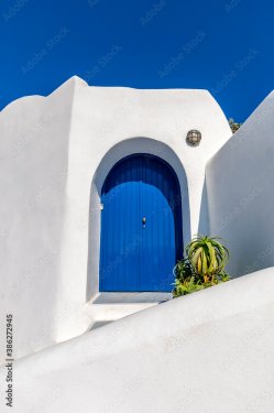 A bright blue door in Santorini, Greece