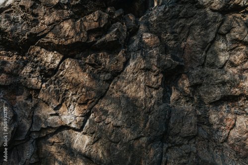 Dark Aged Shabby Cliff Face And Divided By Huge Cracks And Layers - 901158365