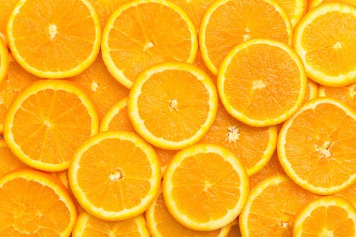 Full frame of fresh orange fruit slices pattern background - 901158379