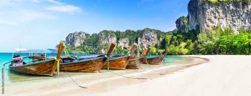 Thai traditional wooden longtail boat and beautiful sand beach - 901158631